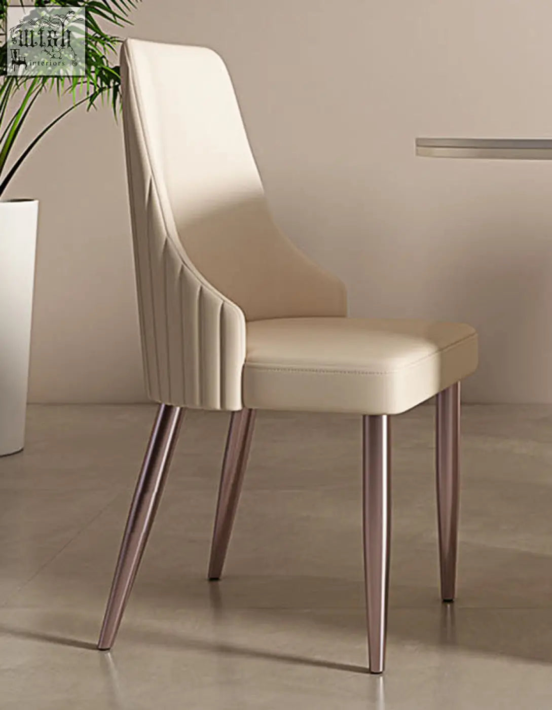 Cream-colored leather eira dining chair with sleek tapered metallic legs perfect for dining with offer financing and shipping cost options