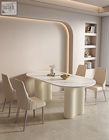 Cream-colored eira dining chair with marble oval table offering financing and low shipping cost options