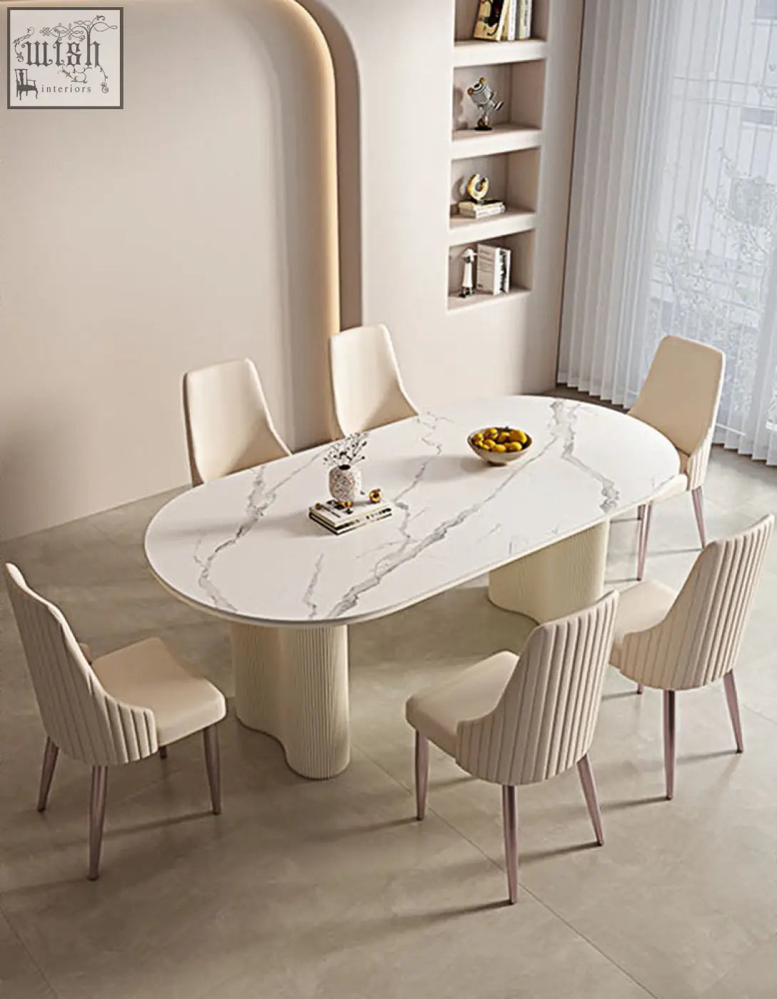 Modern oval dining table with white marble top and cream sculpted pedestal legs paired with offer financing dining chair
