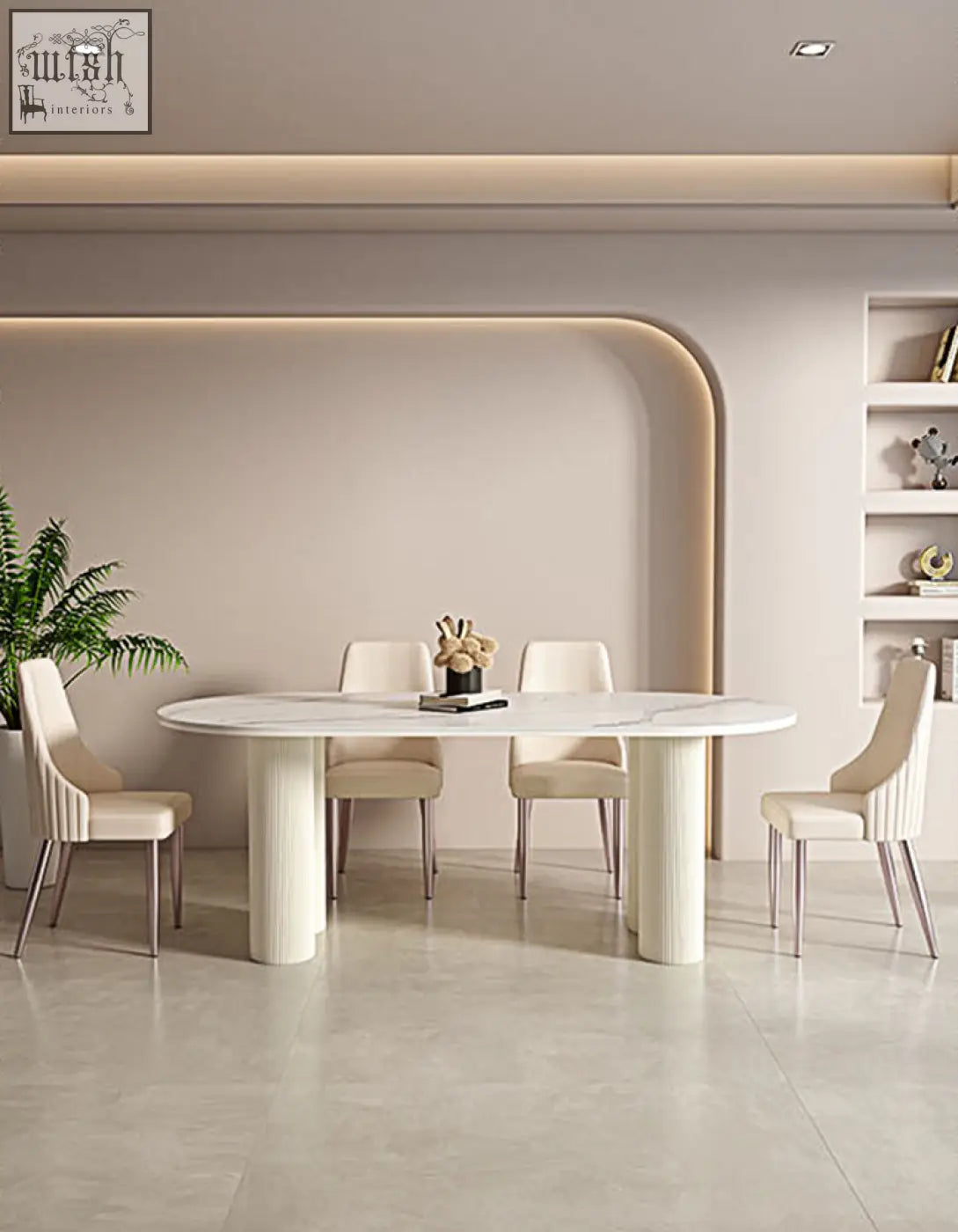 Modern white marble oval dining table with sleek cylindrical legs shown with cream eira dining chair offer financing available