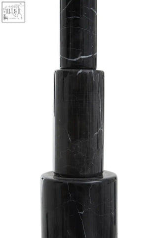 Elara black marble table lamp with sleek stacked cylindrical black marble base and ivory shade
