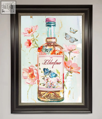 A framed elderflower wine artwork featuring a stylized gin bottle with pink and blue butterflies on a light background