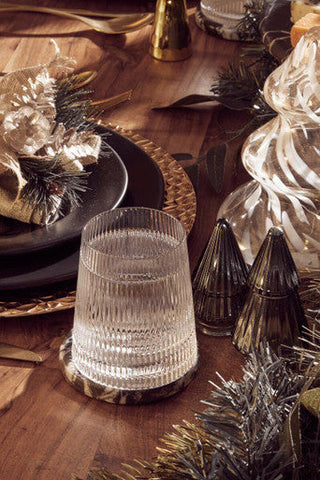 Clear ribbed glass tumbler with a textured base from the eldon set of four ribbed glass tumblers