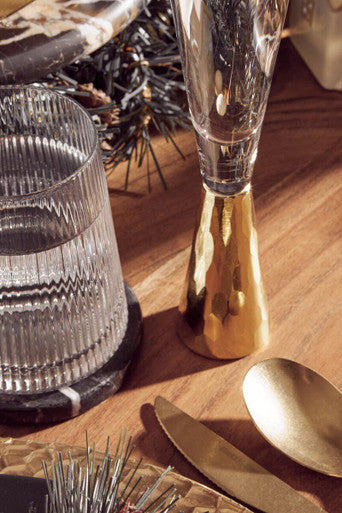 Gold-toned hammered metal jigger with clear glass top complements eldons ribbed glass tumblers set of four