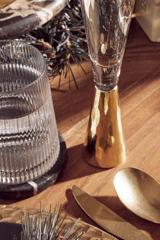 Gold-toned hammered metal jigger with clear glass top complements eldons ribbed glass tumblers set of four