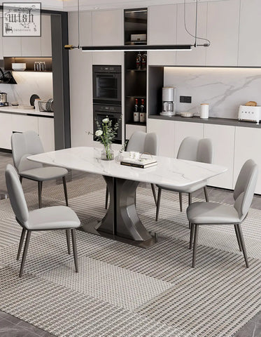Modern white marble dining table with sleek sculpted metallic base perfect for stylish dining space offer financing available