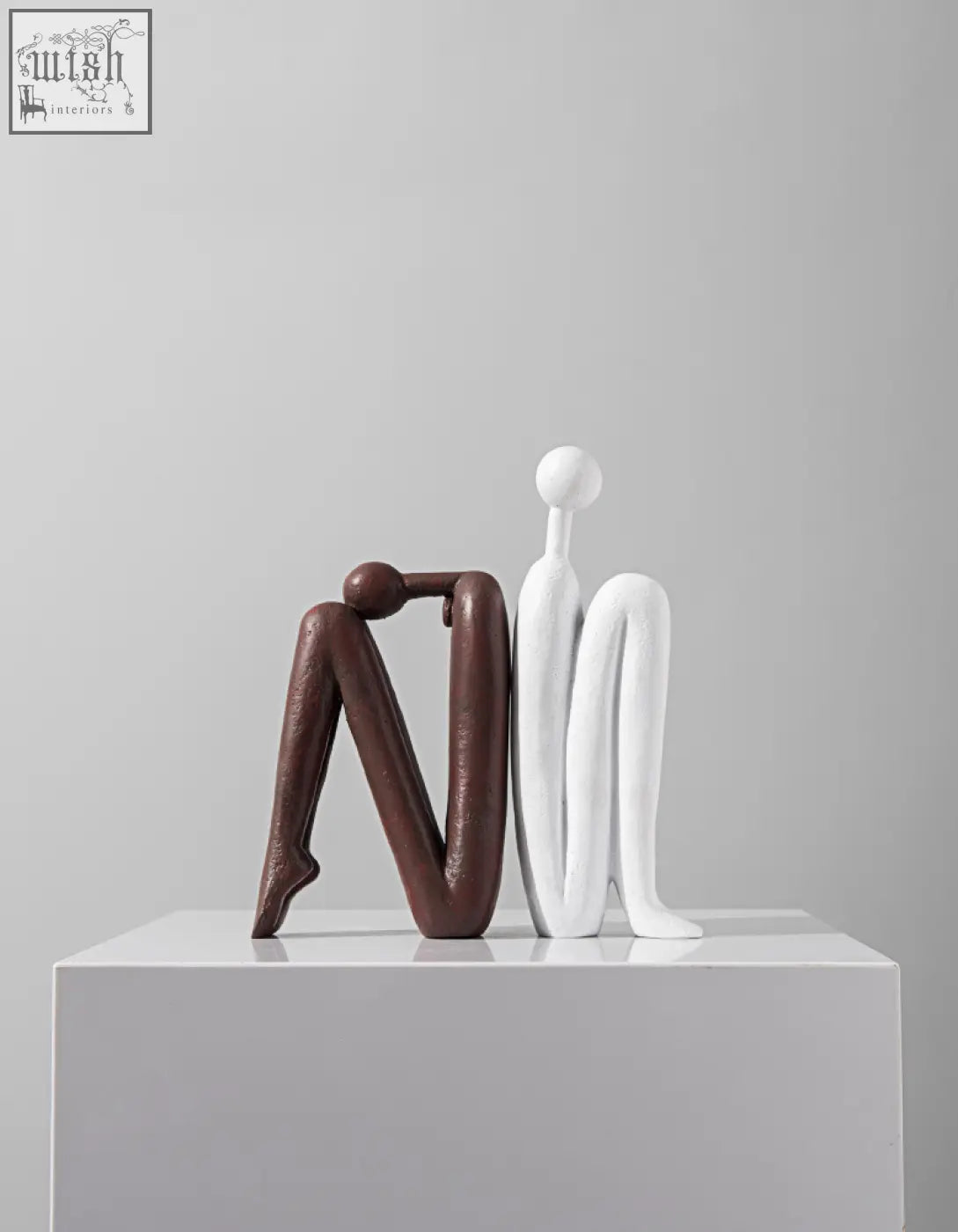 Two minimalist abstract resin eleni bookends in matte brown and glossy white perfect for shelves decorative use with offer financing and shipping cost options
