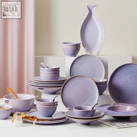Eliana dinner set purple features a matte lavender ceramic dinner set with earthy-toned glaze on plates bowls and serving pieces