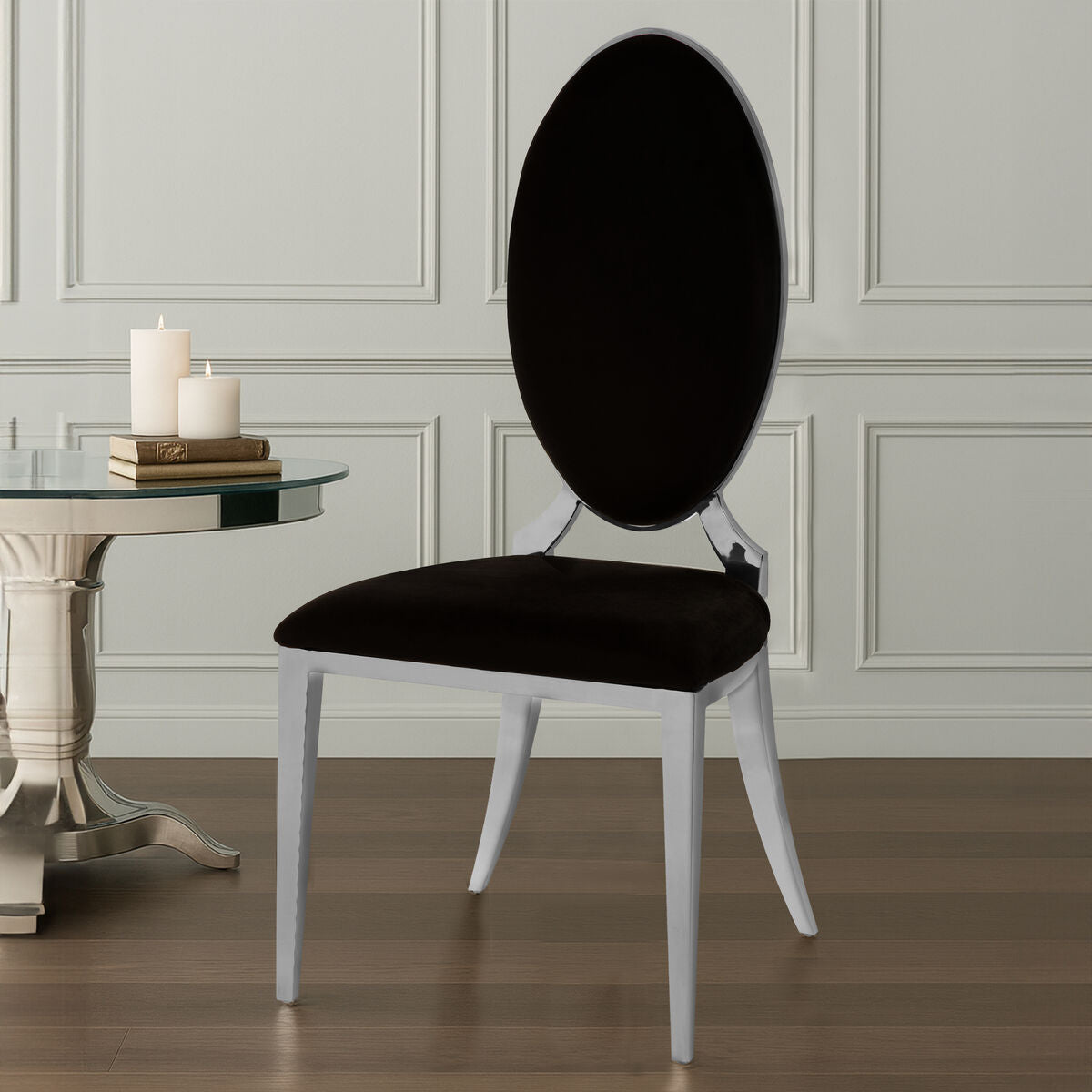 Back view of eliza black velvet dining chair with oval back and white lacquered metal frame