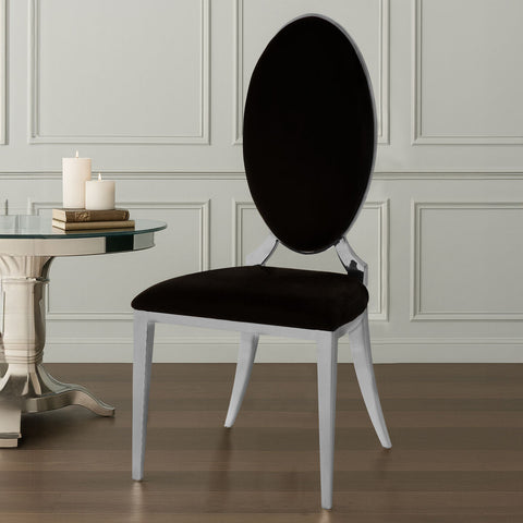 Back view of eliza black velvet dining chair with oval back and white lacquered metal frame