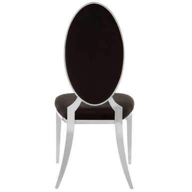 Eliza black velvet dining chair with sleek oval backrest and slender chrome legs in black velvet upholstery