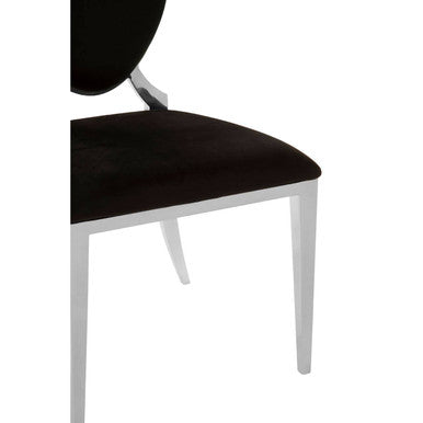 Eliza black velvet dining chair with sleek silver metal legs and curved black velvet upholstered backrest