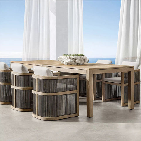 Eliza rattan outdoor light wood outdoor dining table with woven rattan accents and cushioned seats