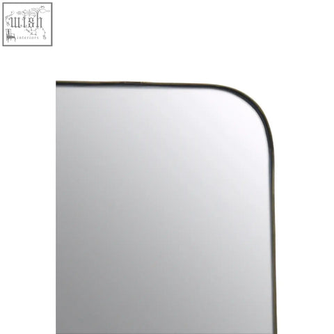 Black-framed rectangular wall mirror with smooth reflective surface ideal as a stylish gold wall mirror option
