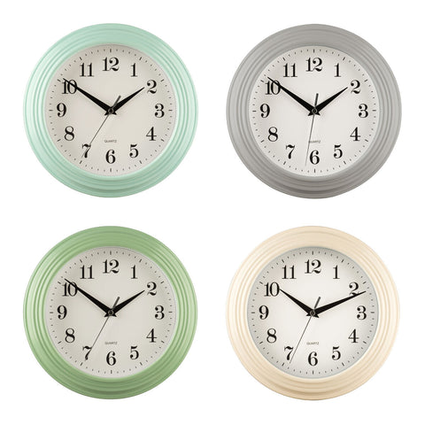 Set of four elliot vintage cream wall clocks with round mint green gray sage and cream frames and white faces