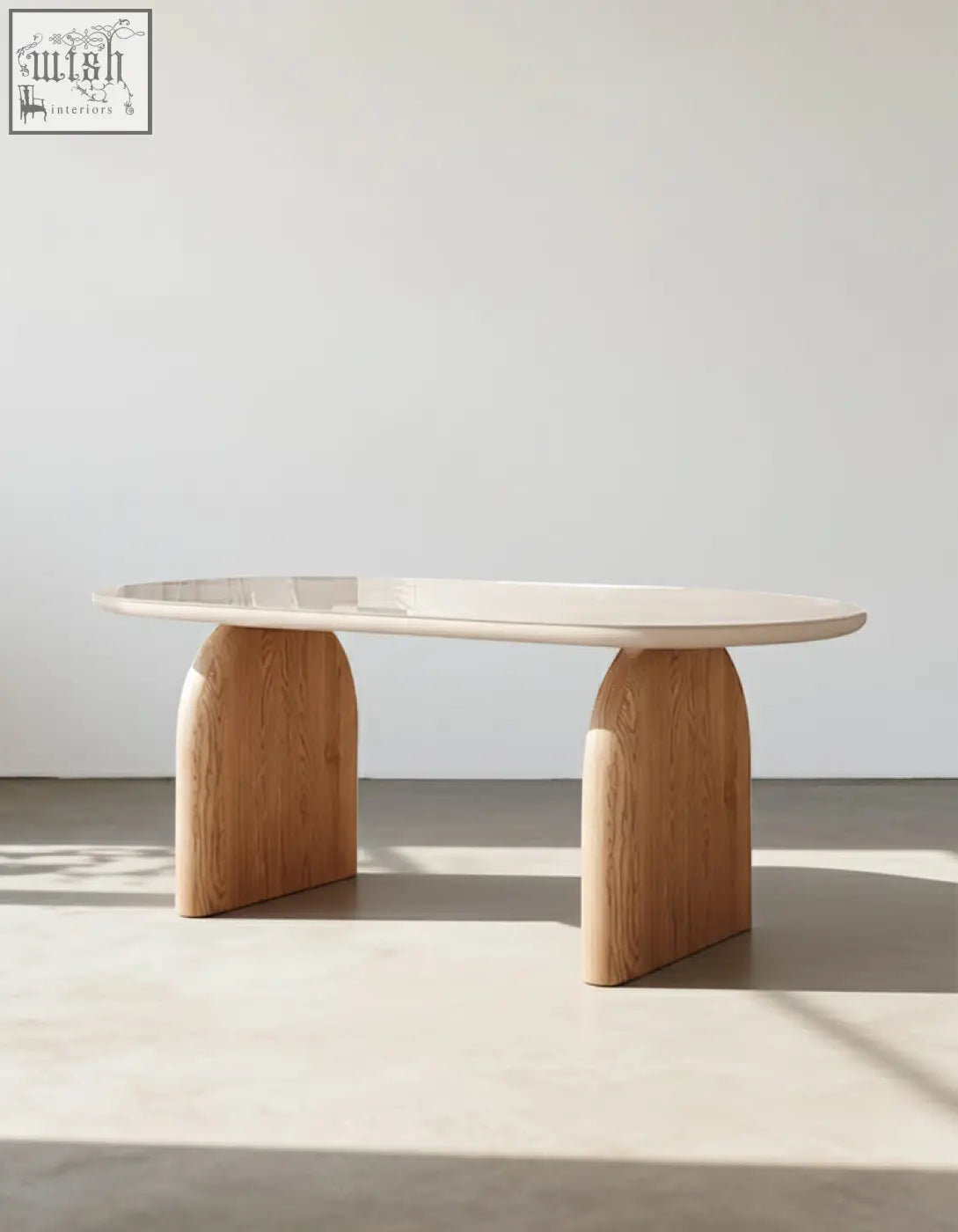 Minimalist ellison modern dining table with white sintered stone top and sturdy arched oak legs