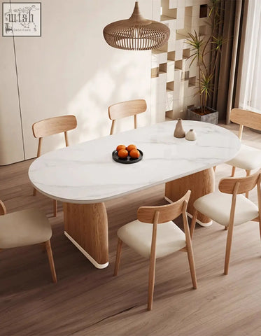 Ellison modern dining table with white sintered stone marble top and light wood oval legs for stylish dining