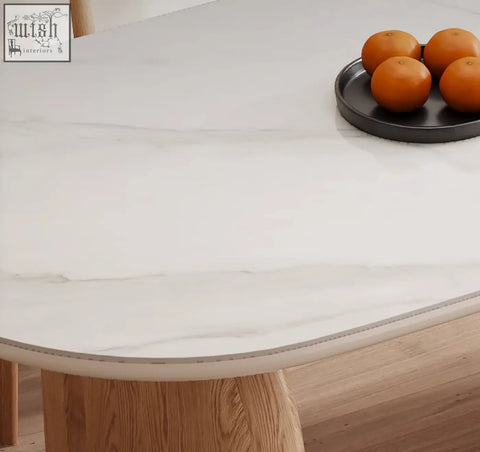 Ellison modern dining table with white marble effect sintered stone tabletop featuring subtle gray veining and gloss
