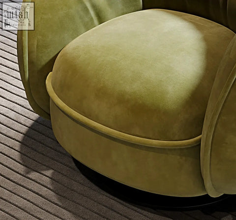 Olive green velvet elowen swivel lounge chair with rounded plush seat and curved arms vintage style