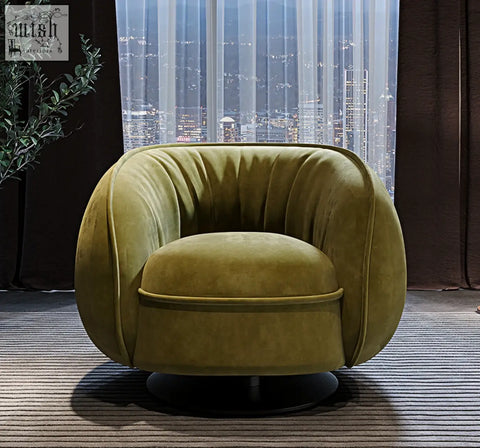 Olive green velvet elowen swivel lounge chair with rounded plush design and black circular base for comfy seating