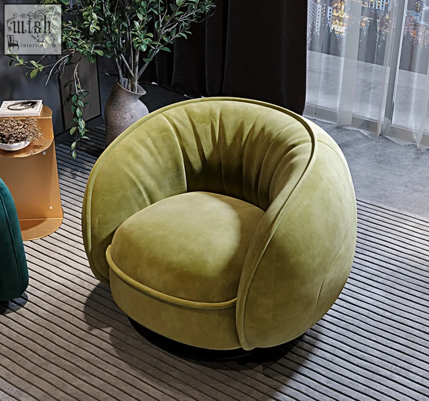 Olive green velvet elowen swivel lounge chair with rounded cocoon design and black base perfect for vintage vibes