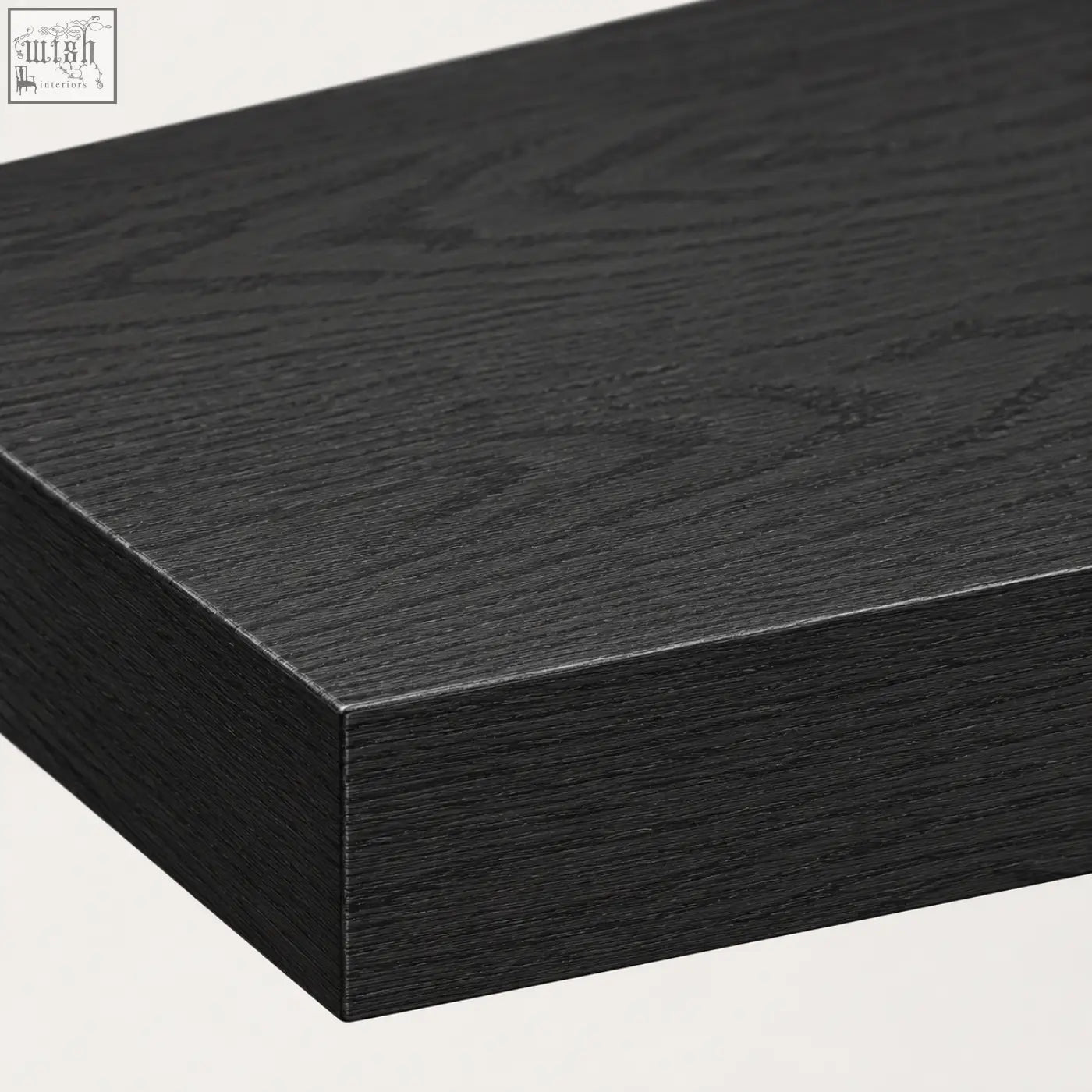 Black wooden console table with smooth matte finish and subtle grain texture in elston geometric design