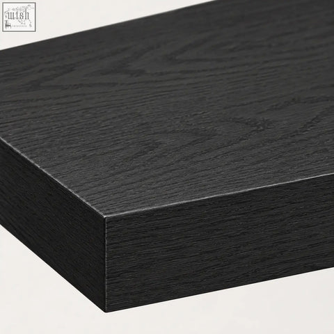 Black wooden console table with smooth matte finish and subtle grain texture in elston geometric design