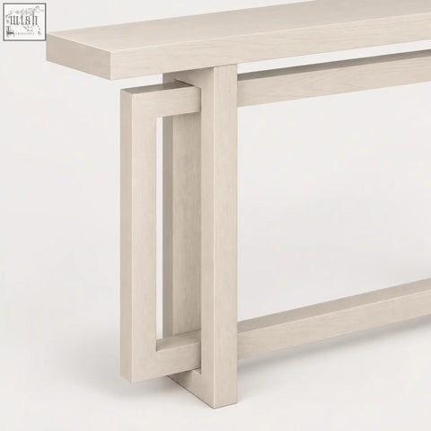 Modern elston geometric console table with light gray matte wood surface and clean geometric legs
