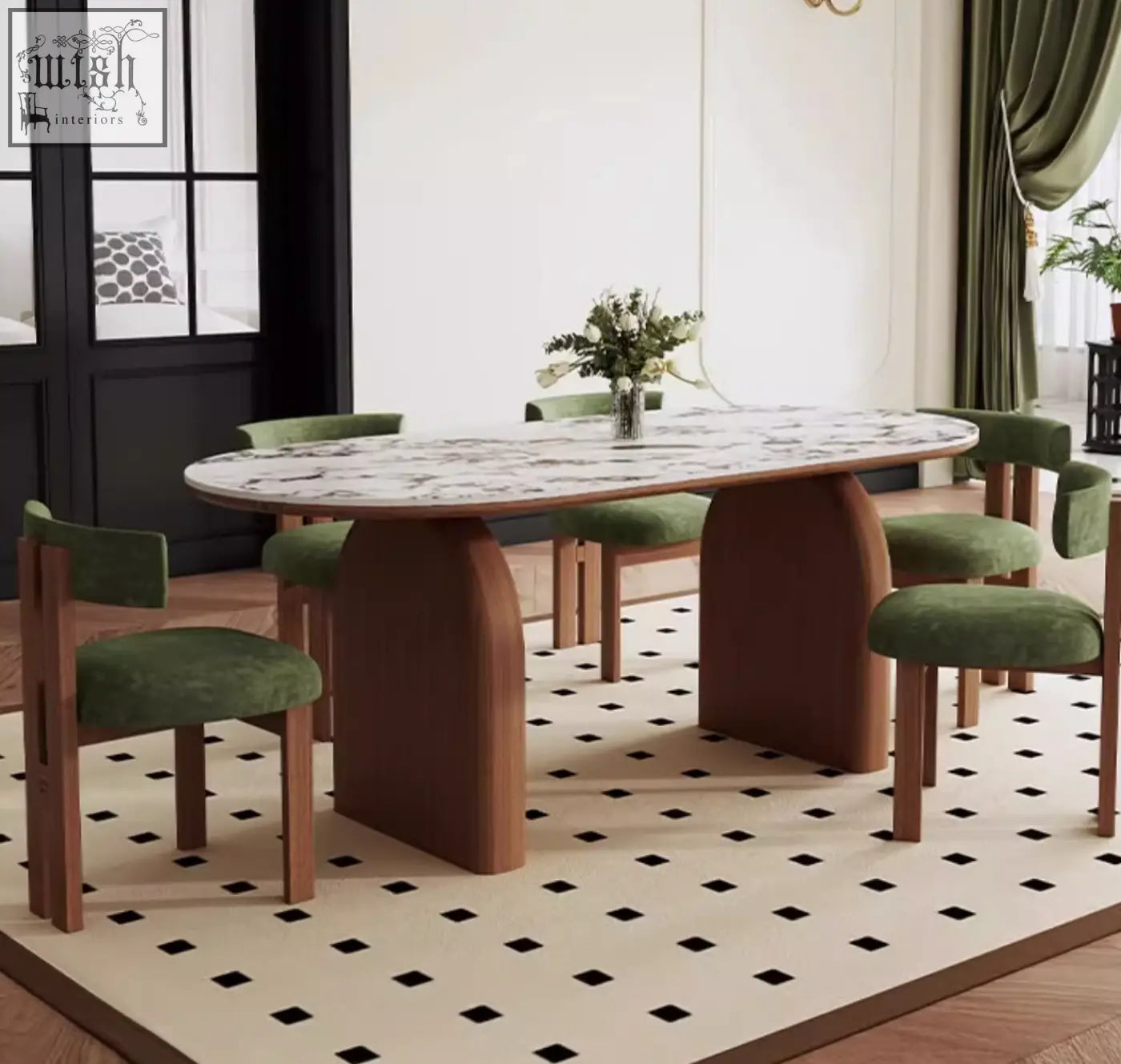 Modern emerson dining table with white marble top gray veining and brown wooden legs surrounded by green velvet chairs