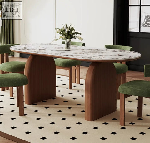 Modern emerson dining table with a white marble top and curved wooden legs in warm brown perfect for dining table use