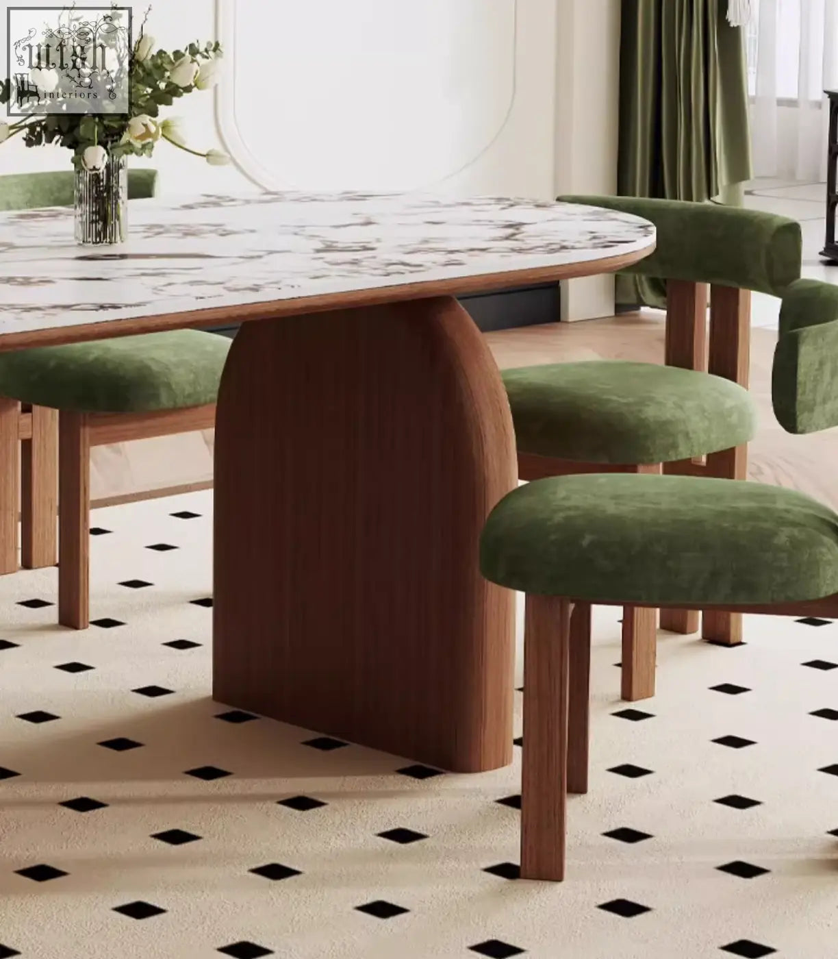 Modern emerson dining table with white sintered stone top and curved wooden base paired with olive green velvet chairs