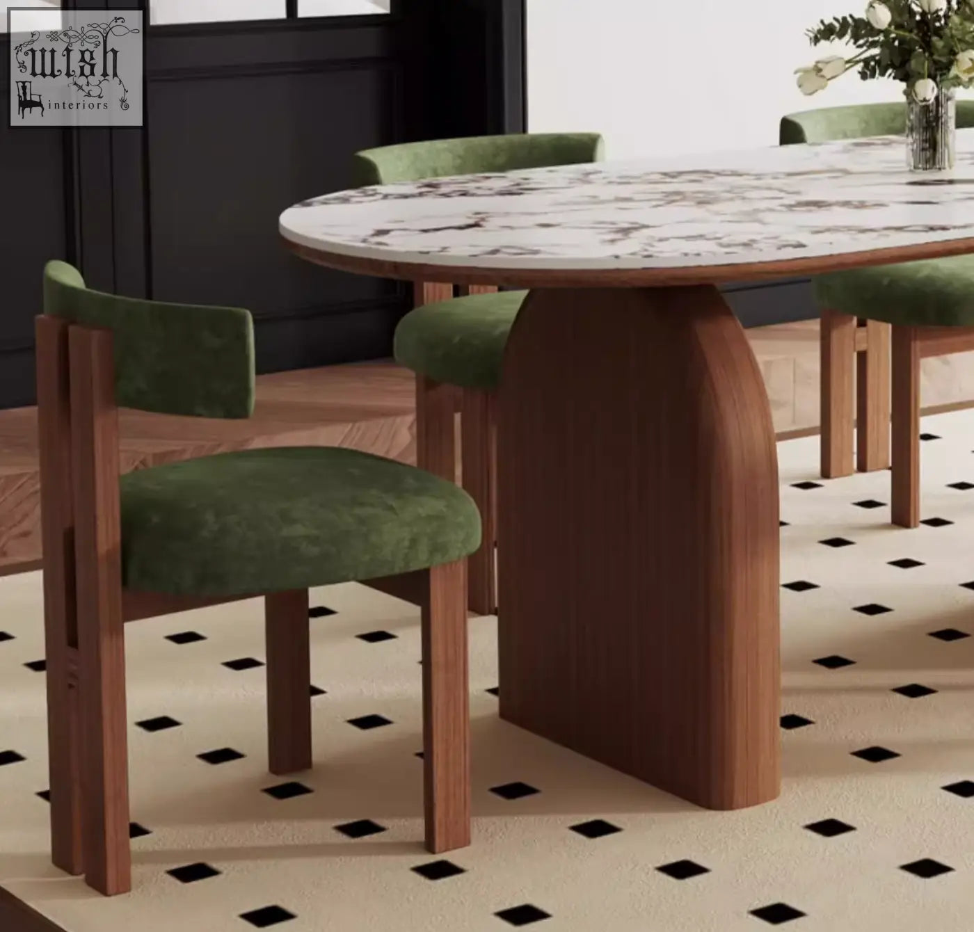 Emerson dining table with round marble top and warm wood base paired with green velvet chairs for dining room