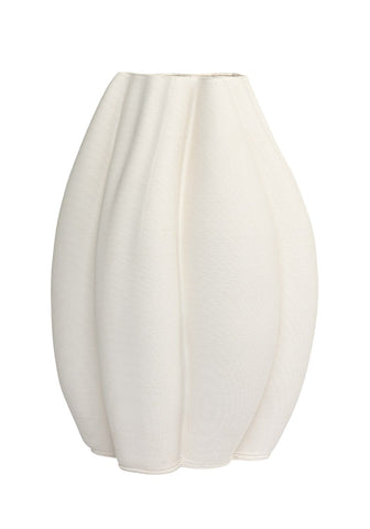 Cream-colored white ceramic vase with ribbed texture and flared sculptural silhouette called Emilie white ceramic vase