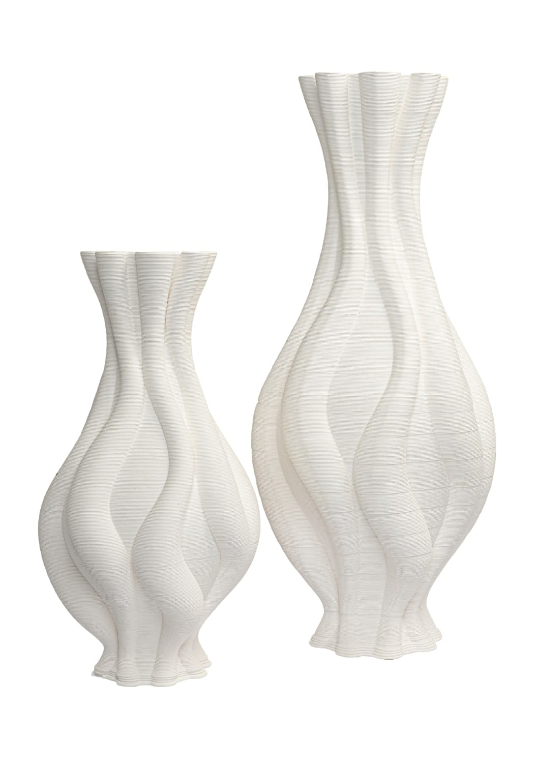 Two elegant white ceramic vases with flowing wave-like contours and textured surface emilie white twisted ceramic vase