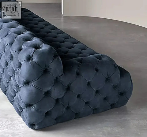 Dark blue velvet tufted emrys chesterfield corner three seater sofa with plush cushioned design and elegant style