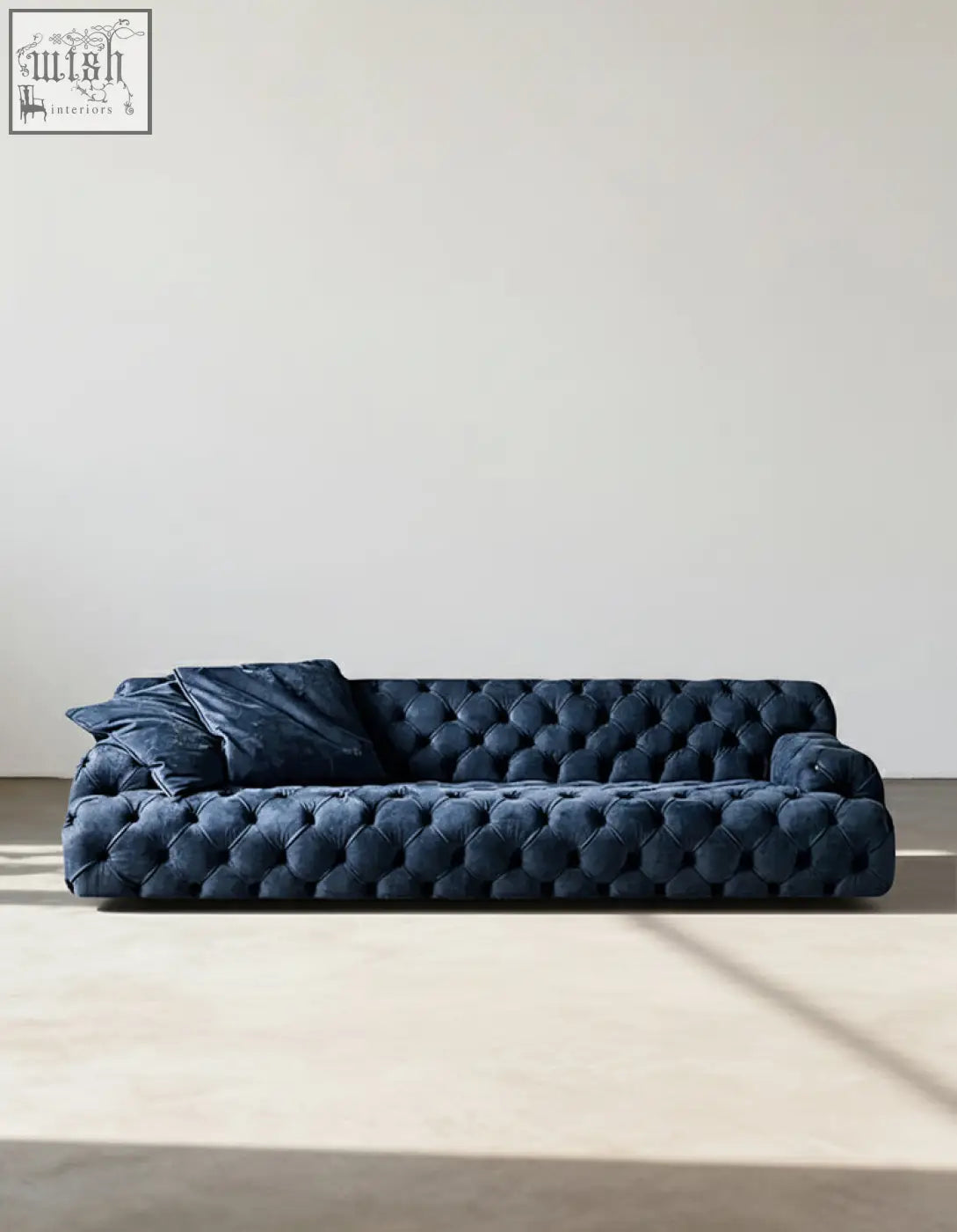 Deep navy velvet emrys chesterfield corner sofa with classic tufted design and plush rounded armrests