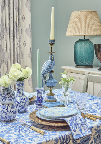 Blue and white porcelain enamelled pretty polly parrot candlestick with intricate floral patterns front view