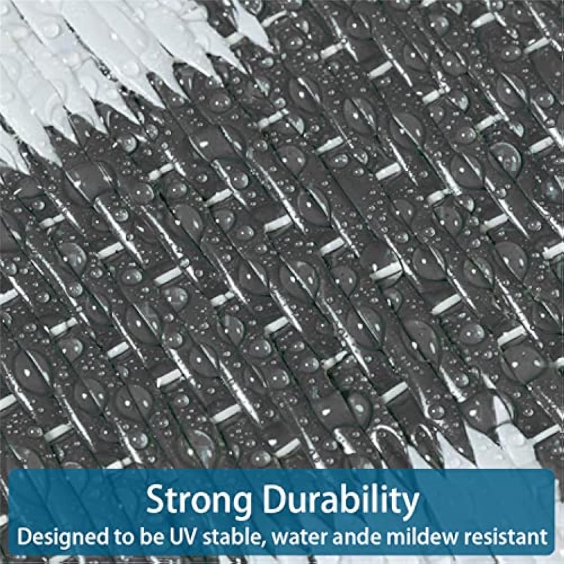 Black and white woven enipate geometric outdoor rug with textured interlaced pattern perfect for patios and gardens
