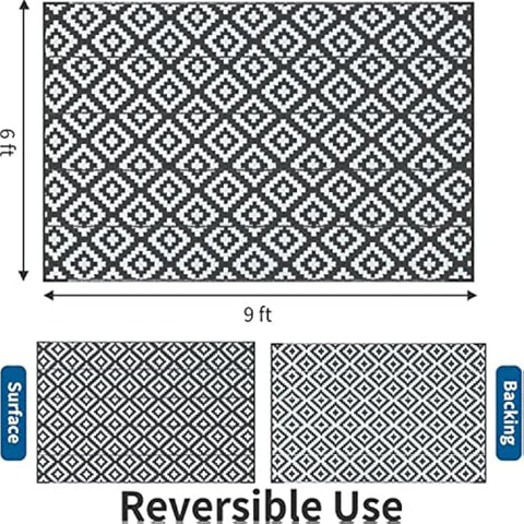 Black and white geometric patterned reversible woven outdoor rug 9x6 feet perfect for patios and decks
