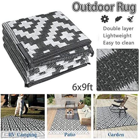 Black and white geometric patterned enipate outdoor rug with double-layer lightweight weave for patios and decks
