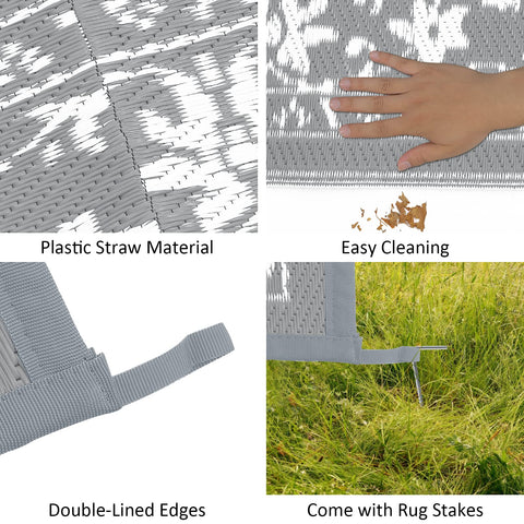 Gray plastic straw woven outdoor patio rug with double-lined edges and stakes for extra large outdoor area use