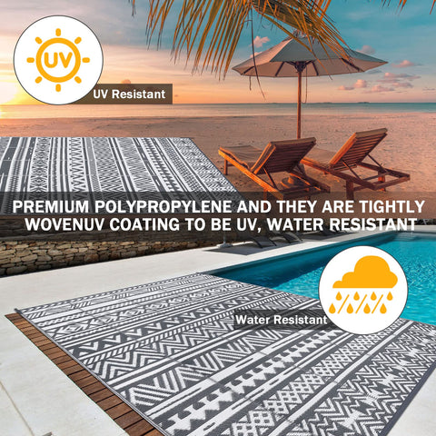 Enyhom large grey outdoor rug with black and white geometric pattern made of uv-resistant polypropylene for patio use