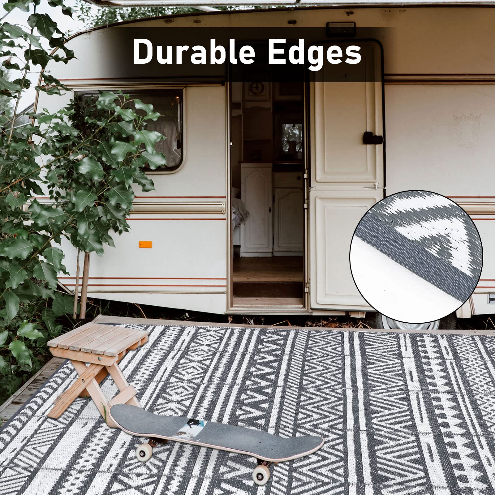 Black and white geometric patterned enyhom large grey outdoor rug with durable reinforced edges for outdoor patio use