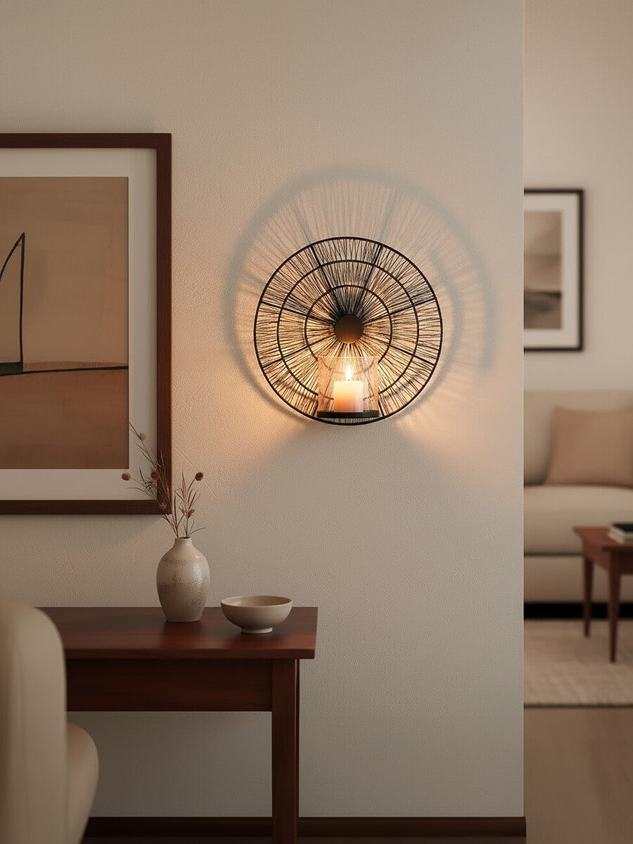 Enzo black wire wall sconce with circular wireframe design and central candle holder for stylish lighting