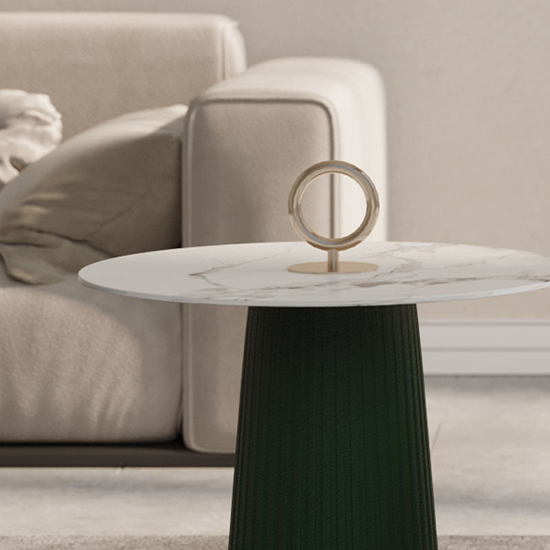 A sleek erica coffee table set with a white marble top and dark green ribbed base for stylish living rooms