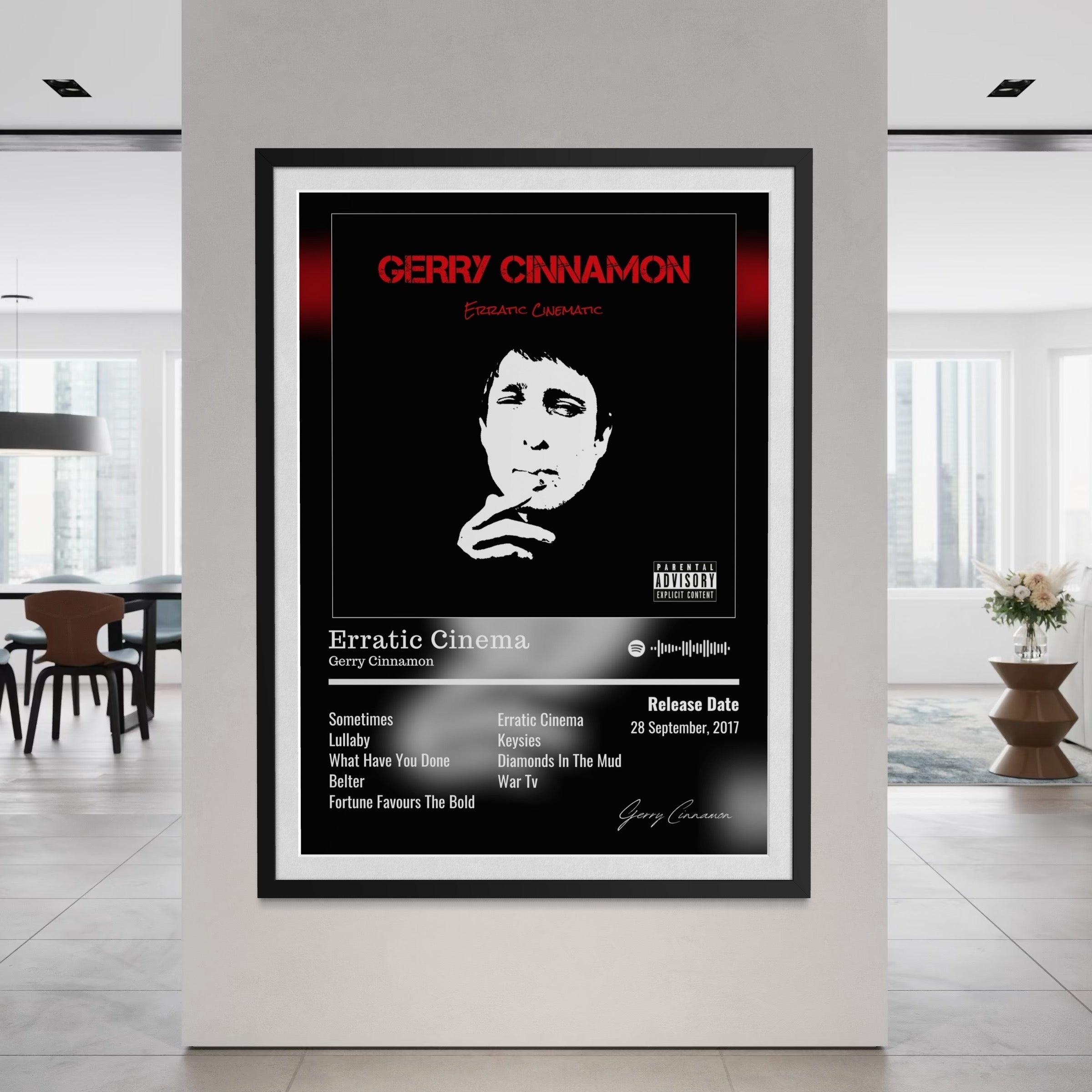 Black and red framed album poster featuring stylized white silhouette of gerry cinnamon for erratic cinema album