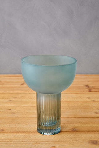 Esma small light blue glass vase with a translucent flared top and vertical ribbed blue glass stem