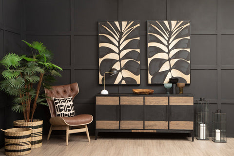 Modern black and wood-toned sideboard showcasing a small light blue glass vase with sleek minimalist design