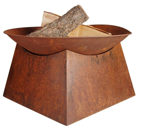 Rustic copper-toned esschert design metal fire pit with geometric base and stacked logs inside for outdoor use