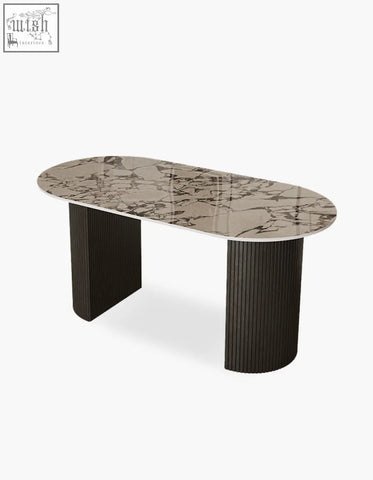 Elegant esther oval dining table with sleek gray and white marble top and dark ribbed legs perfect dining table